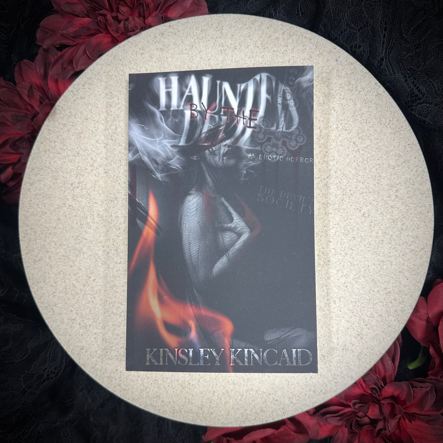 Haunted by the Devil (The Devil's Society #1) by Kinsley Kincaid