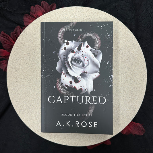 Captured (Blood Ties #8) by A.K. Rose
