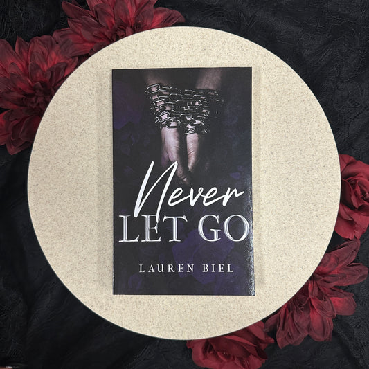 Never Let Go by Lauren Biel